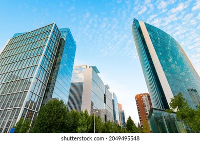 Sleek modern high-rise commercial building facade representing financial efficiency and prestige at Lake Merritt Plaza in Oakland.